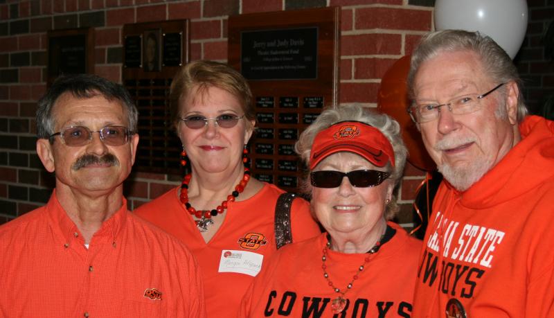 Dale and Margie Alspach and CJ and Nicki Clark at the A&S game day reception