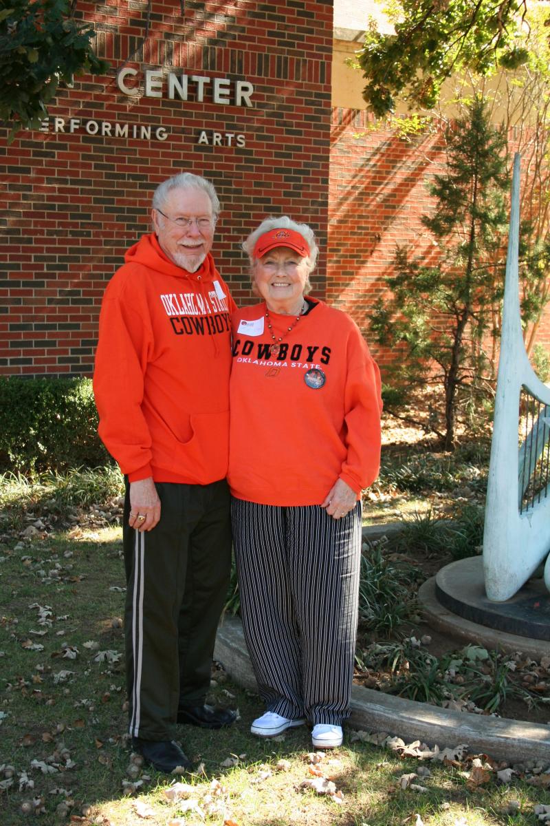 CJ and Nicki Clark standing near the Seretean Center